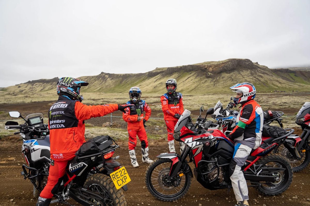 Riding safety training: instructor briefing a group with Honda Africa Twin